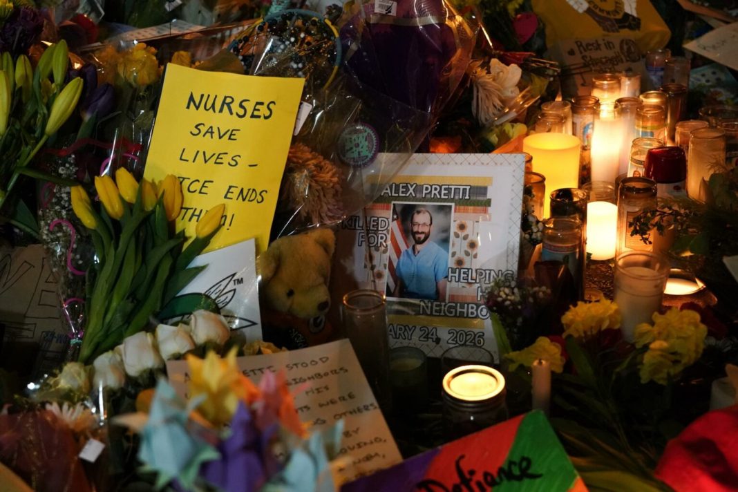 People protest after fatal shooting of man by federal agents