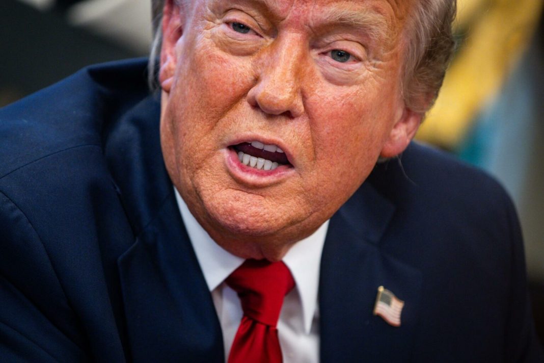 US President Trump signs executive orders in the Oval Office